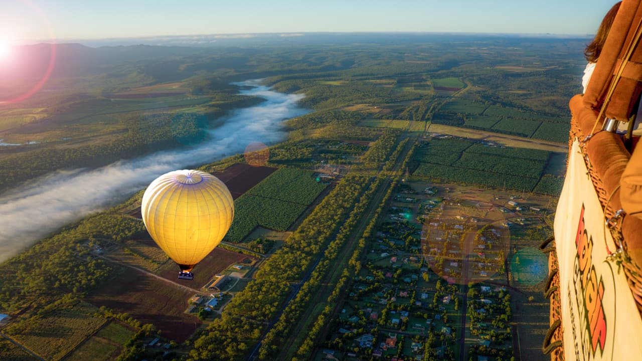 Sunrise Hot Air Balloon Flight near Cairns with Sparkling Wine and Optional Round Trip Transfer – photo 2