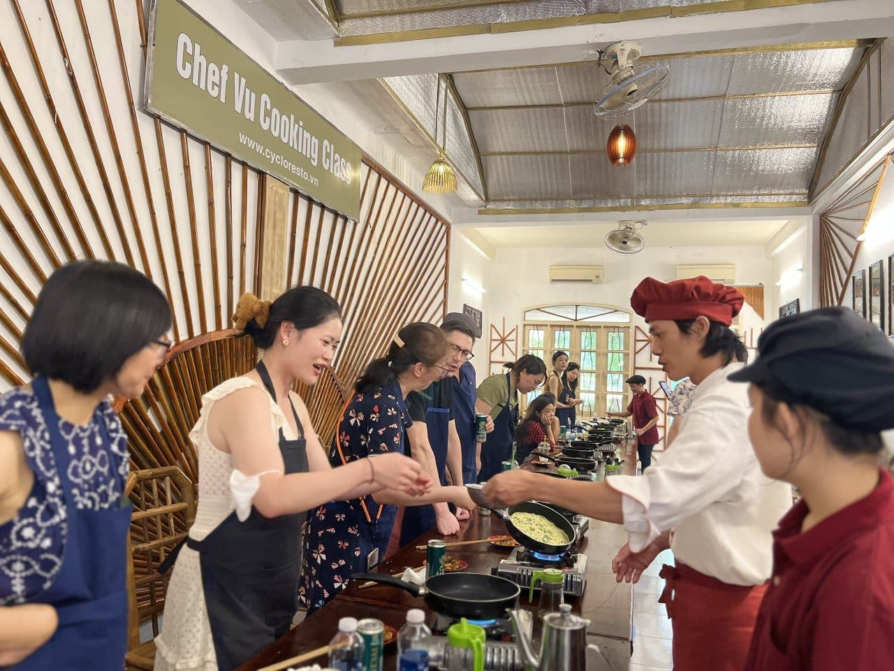 Chef Vu Cooking Class with Market Tour and Cyclo Ride