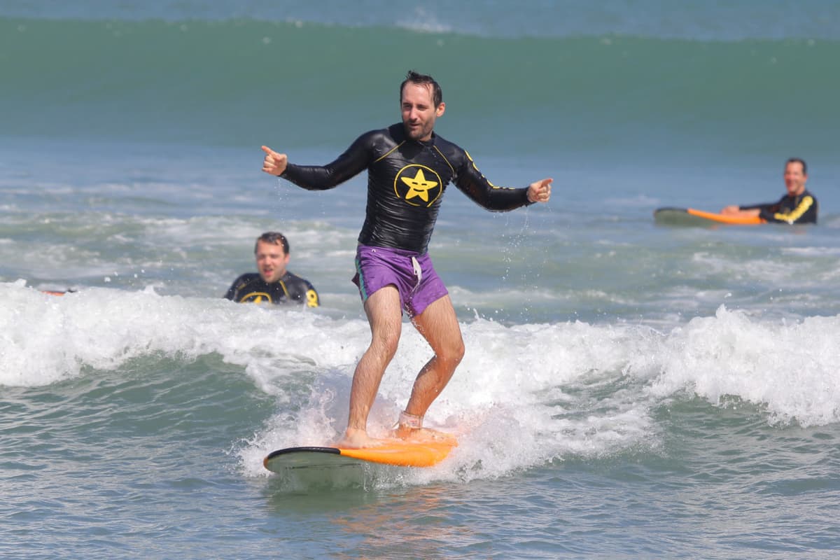 Surfing Lessons by Odysseys Surf School