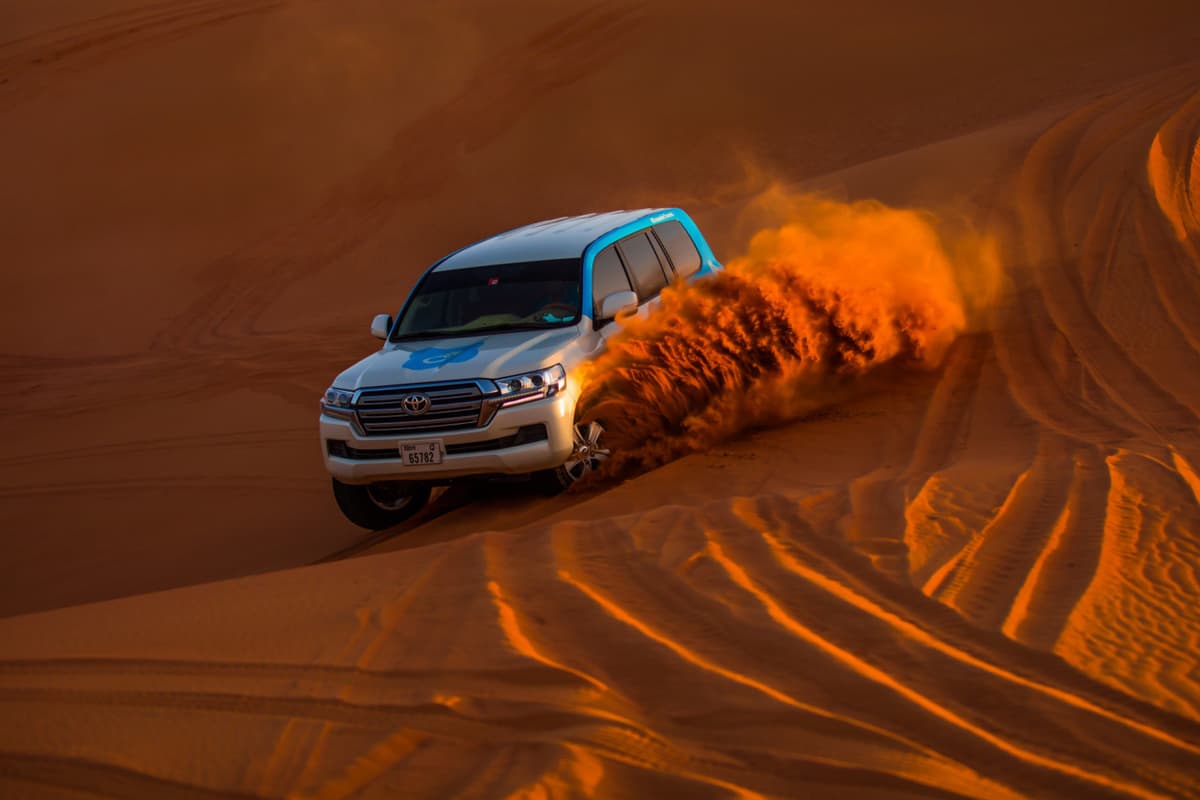 Dubai Red Dunes Desert Safari Tour with Camel Ride and Buffet Dinner at Al Khayma Camp