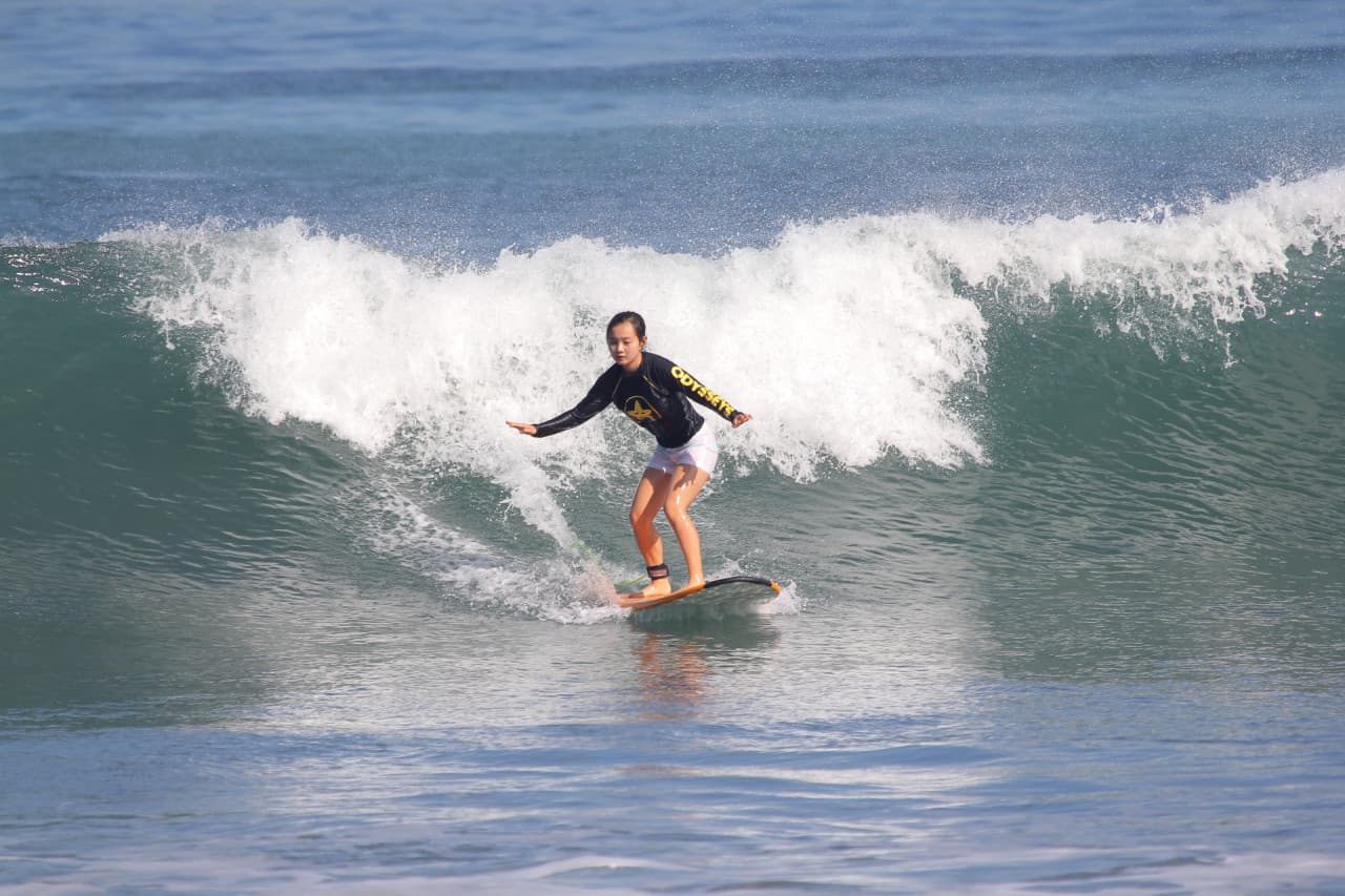 Surfing Lessons by Odysseys Surf School