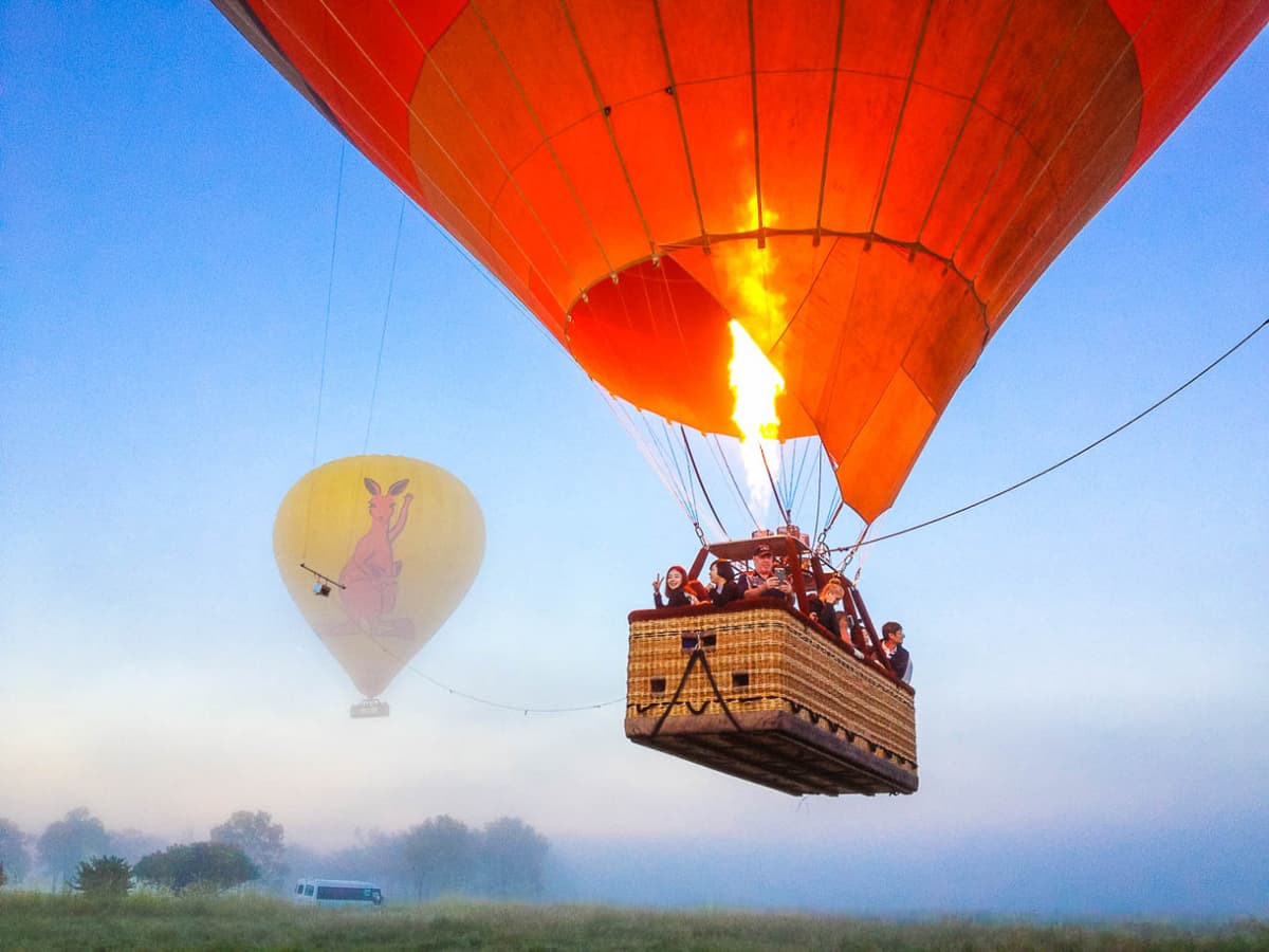 Sunrise Hot Air Balloon Flight near Cairns with Sparkling Wine and Optional Round Trip Transfer