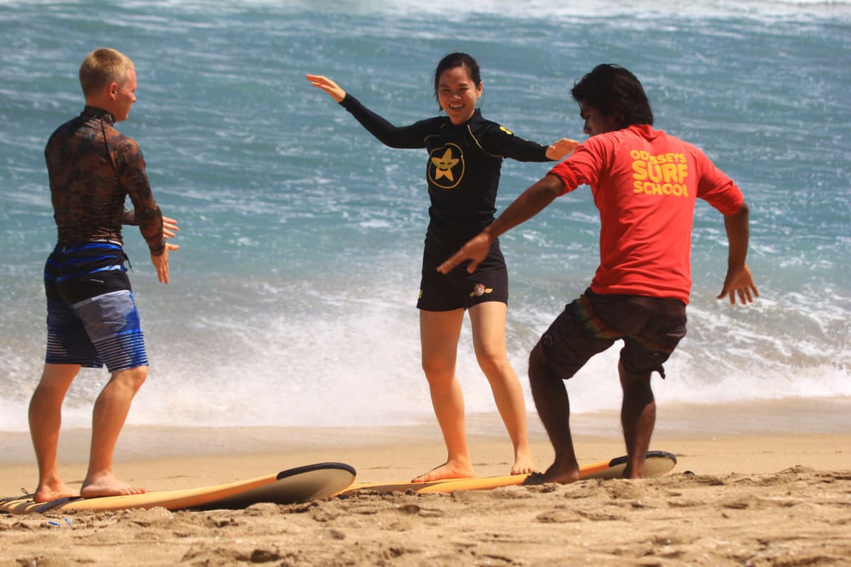 Surfing Lessons by Odysseys Surf School