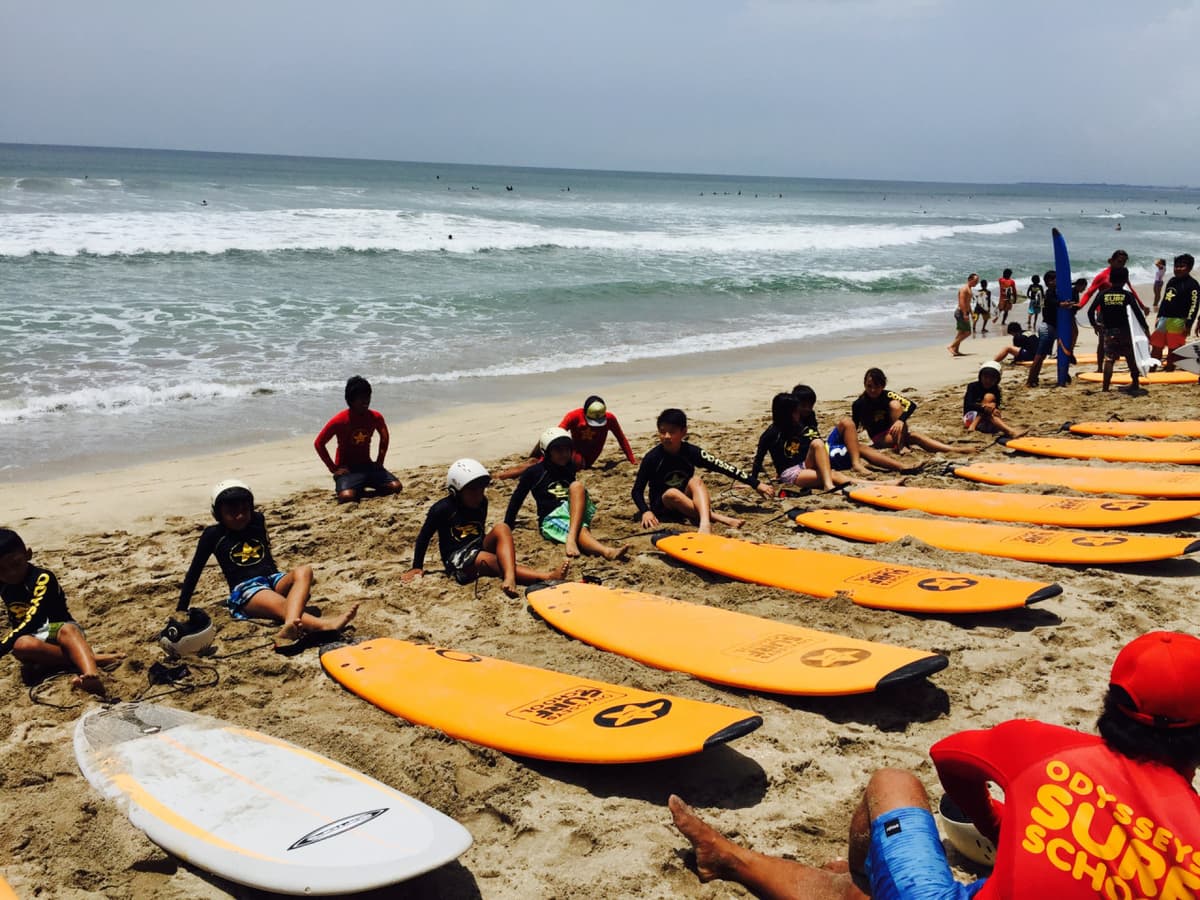 Surfing Lessons by Odysseys Surf School