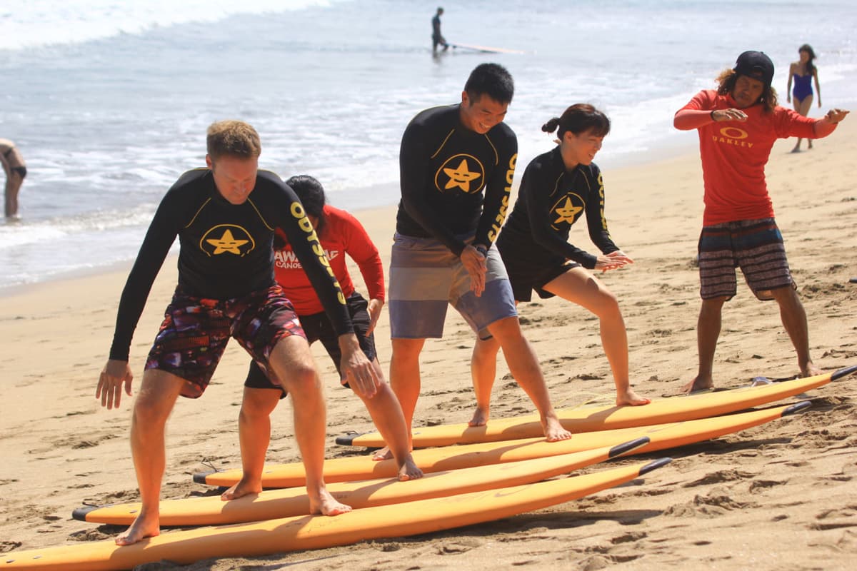 Surfing Lessons by Odysseys Surf School
