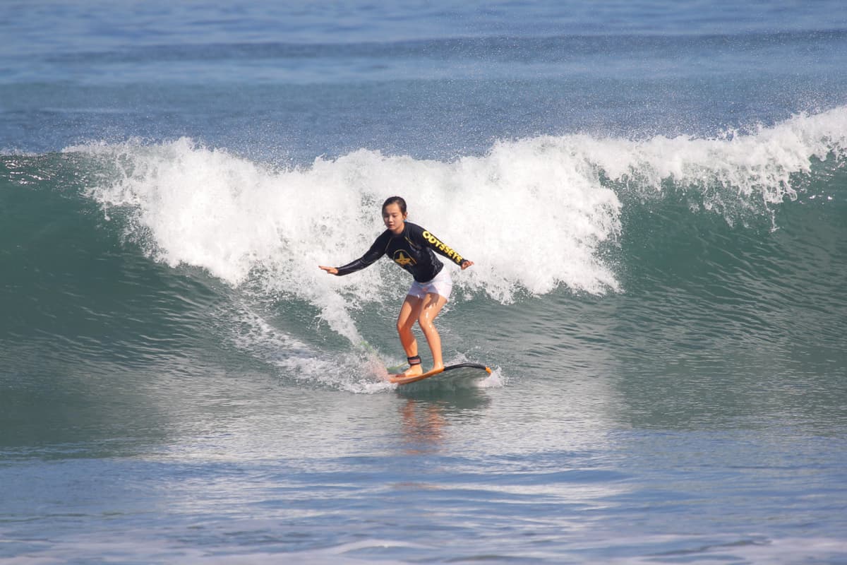 Surfing Lessons by Odysseys Surf School